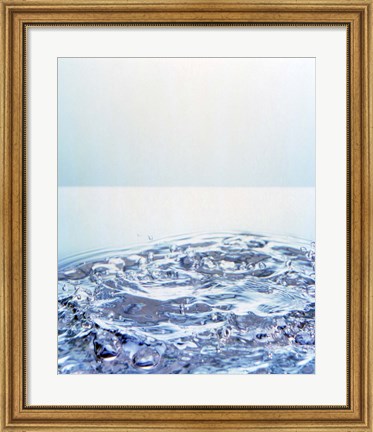 Framed Churning water bubbles in bright light Print