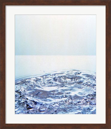 Framed Churning water bubbles in bright light Print