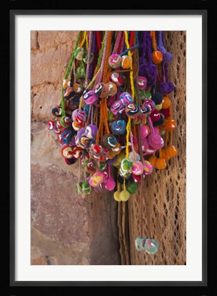 Framed Multi-colored hangings on wall, Tulmas, Purmamarca, Quebrada De Humahuaca, Argentina Print