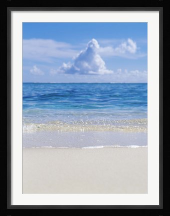 Framed Tropical beach with blue skies in background Print