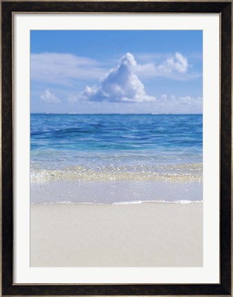 Framed Tropical beach with blue skies in background Print