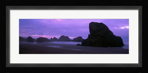 Framed Silhouette of rock formations in the sea against a pink sky, Myers Creek Beach, Oregon Print