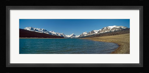 Framed Lake with snow covered mountains in the background, Sherburne Lake, US Glacier National Park, Montana, USA Print