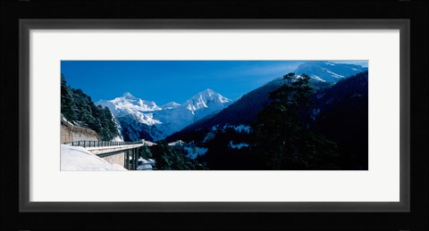 Framed Bridge through Snowcapped mountain range, Valais Canton, Switzerland Print