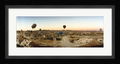 Framed Hot air balloons traversing Cappadocia, Central Anatolia Region, Turkey Print