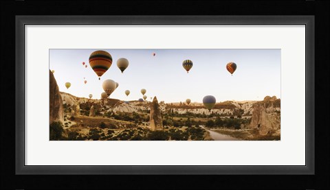 Framed Hot air balloons over landscape at sunrise, Cappadocia, Central Anatolia Region, Turkey Print