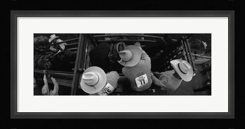Framed High angle view of cowboys with horses at rodeo, Wichita Falls, Texas, USA Print