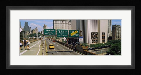 Framed Suspension bridge with buildings in a city, Brooklyn Bridge, New York City, New York State, USA Print