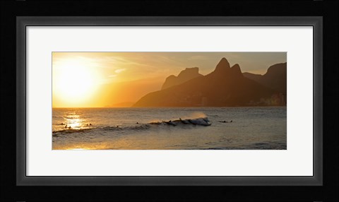 Framed Surfers at sunset on Ipanema Beach, Rio De Janeiro, Brazil Print