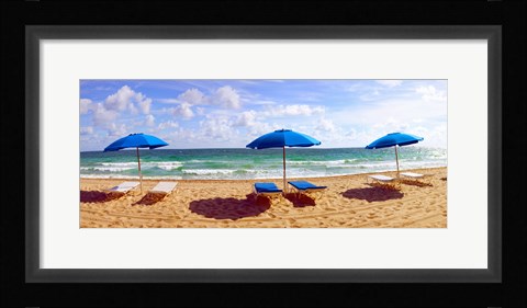 Framed Lounge chairs and beach umbrellas on the beach, Fort Lauderdale Beach, Florida, USA Print