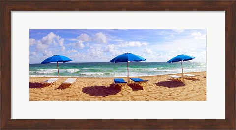 Framed Lounge chairs and beach umbrellas on the beach, Fort Lauderdale Beach, Florida, USA Print