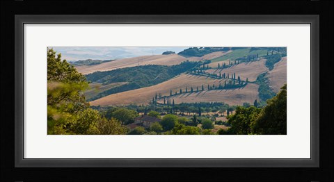 Framed High angle view of winding road in valley, Tuscany, Italy Print