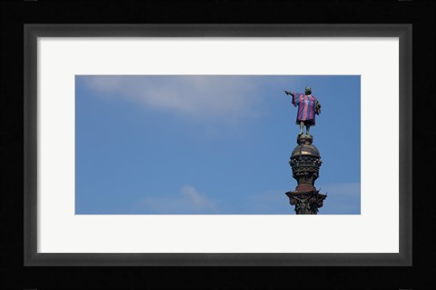 Framed Low angle view of a monument, Columbus Monument wearing soccer jersey, Barcelona, Catalonia, Spain Print
