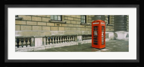 Framed Telephone booth at the roadside, London, England Print