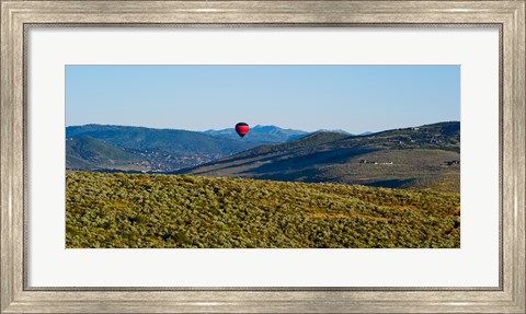 Framed Hot air balloon flying in a valley, Park City, Utah, USA Print