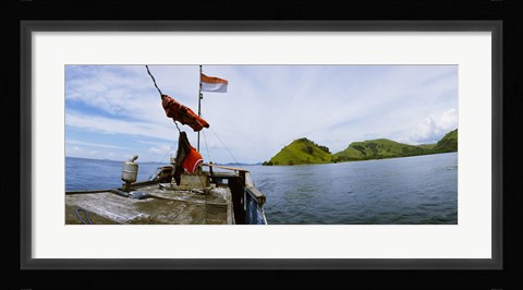 Framed Boat in the sea with islands in the background, Flores Island, Indonesia Print