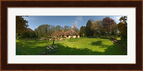 Framed Millstream cottages, Egerton, Kent, England Print