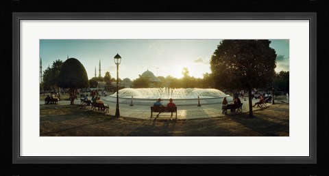 Framed People sitting at a fountain with Blue Mosque in the background, Istanbul, Turkey Print