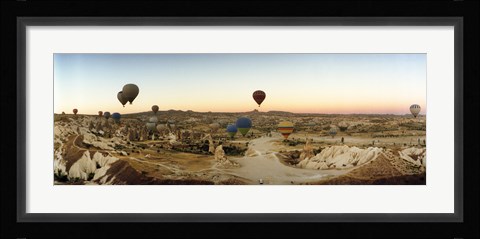 Framed Hot air balloons traversing Cappadocia, Central Anatolia Region, Turkey Print
