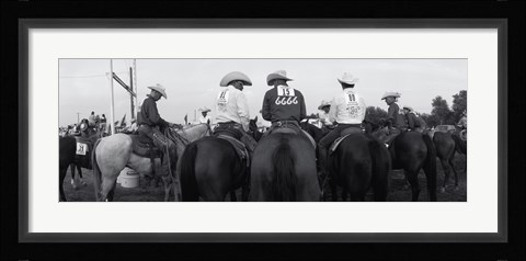 Framed Cowboys on horses at rodeo, Wichita Falls, Texas, USA Print
