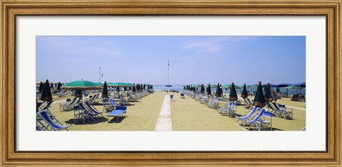 Framed Deck chairs and umbrellas on the beach, Viareggio, Tuscany, Italy Print