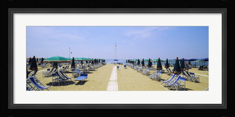 Framed Deck chairs and umbrellas on the beach, Viareggio, Tuscany, Italy Print