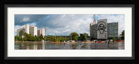 Framed Metal sculptures of Camilo Cienfuegos and Che Guevara on two buildings, Revolutionary Square, Vedado, Havana, Cuba Print