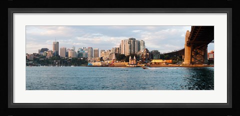 Framed Skyscrapers at the waterfront, McMahons Point, Sydney Harbor Bridge, Sydney Harbor, Sydney, New South Wales, Australia 2012 Print
