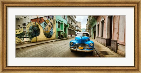 Framed Old car and a mural on a street, Havana, Cuba Print