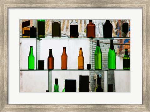 Framed Bottles displayed at foreigner bar, Old Town, Dali, Yunnan Province, China Print