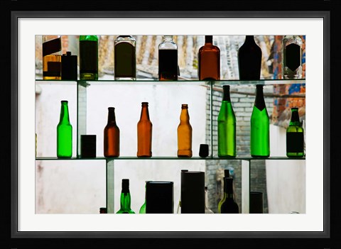 Framed Bottles displayed at foreigner bar, Old Town, Dali, Yunnan Province, China Print