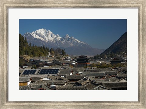 Framed High angle view of houses with Jade Dragon Snow Mountain in the background, Old Town, Lijiang, Yunnan Province, China Print