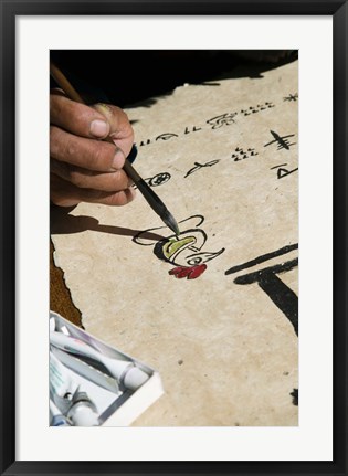 Framed Chinese calligrapher painting calligraphy on a paper at the Dongba Place, Old Town, Lijiang, Yunnan Province, China Print