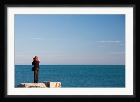 Framed Woman photographing with a camera at Le Cap d' Agde, Herault, Languedoc-Roussillon, France Print
