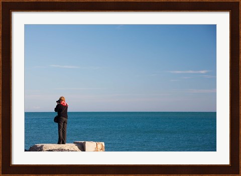 Framed Woman photographing with a camera at Le Cap d&#39; Agde, Herault, Languedoc-Roussillon, France Print