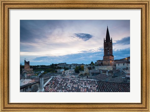 Framed Elevated view of a town with Eglise Monolithe church at dusk, Saint-Emilion, Gironde, Aquitaine, France Print