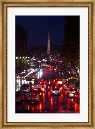 Framed Elevated view of traffic on the road at night viewed from Eglise Madeleine church, Rue Royale, Paris, Ile-de-France, France Print