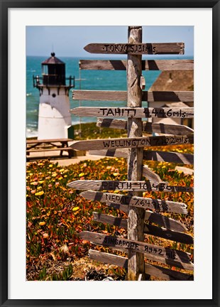 Framed Directional signs on a pole with light house in the background, Point Montara Lighthouse, Montara, California, USA Print