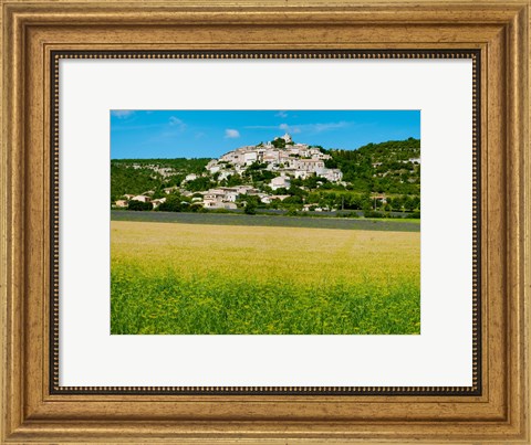 Framed Farm with a town in the background, Simiane-La-Rotonde, Alpes-de-Haute-Provence, Provence-Alpes-Cote d&#39;Azur, France Print
