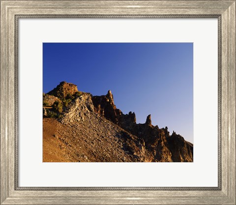 Framed Hillman Peak crags at sunrise, Crater Lake National Park, Oregon, USA Print