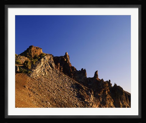 Framed Hillman Peak crags at sunrise, Crater Lake National Park, Oregon, USA Print