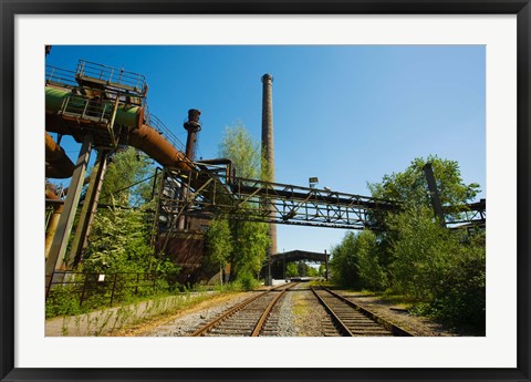Framed Railroad tracks passing through an old steel mill, North Duisburg Landscape Park, Ruhr, North Rhine Westphalia, Germany Print