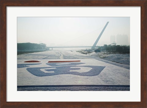 Framed Songhuajiang Highway Bridge across the frozen Songhua River, Harbin, China Print