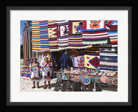 Framed Two female vendors dressed in Mayan costumes displaying products Print
