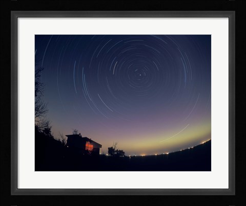 Framed Circumpolar star trails with a faint aurora over horizon, Alberta, Canada Print