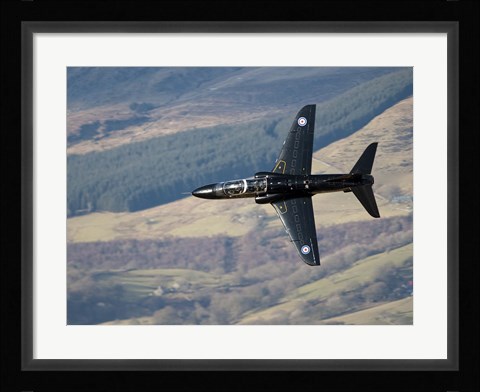 Framed Hawk T1 trainer aircraft of the Royal Air Force low flying over North Wales Print