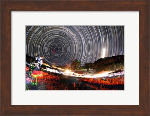 Framed Astronomers observe polar star trails above a mountain in Iran Print