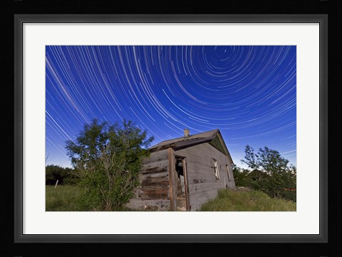 Framed Circumpolar star trails above an old farmhouse in Alberta, Canada Print