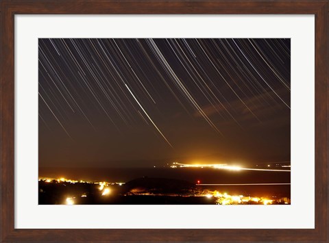 Framed Star trails above a village in the central desert of Iran Print