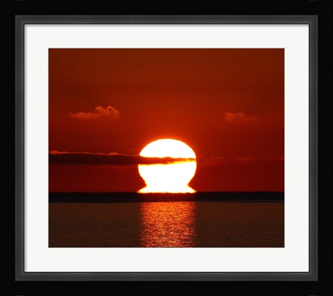 Framed omega-shaped sunrise above the water in Buenos Aires, Argentina Print